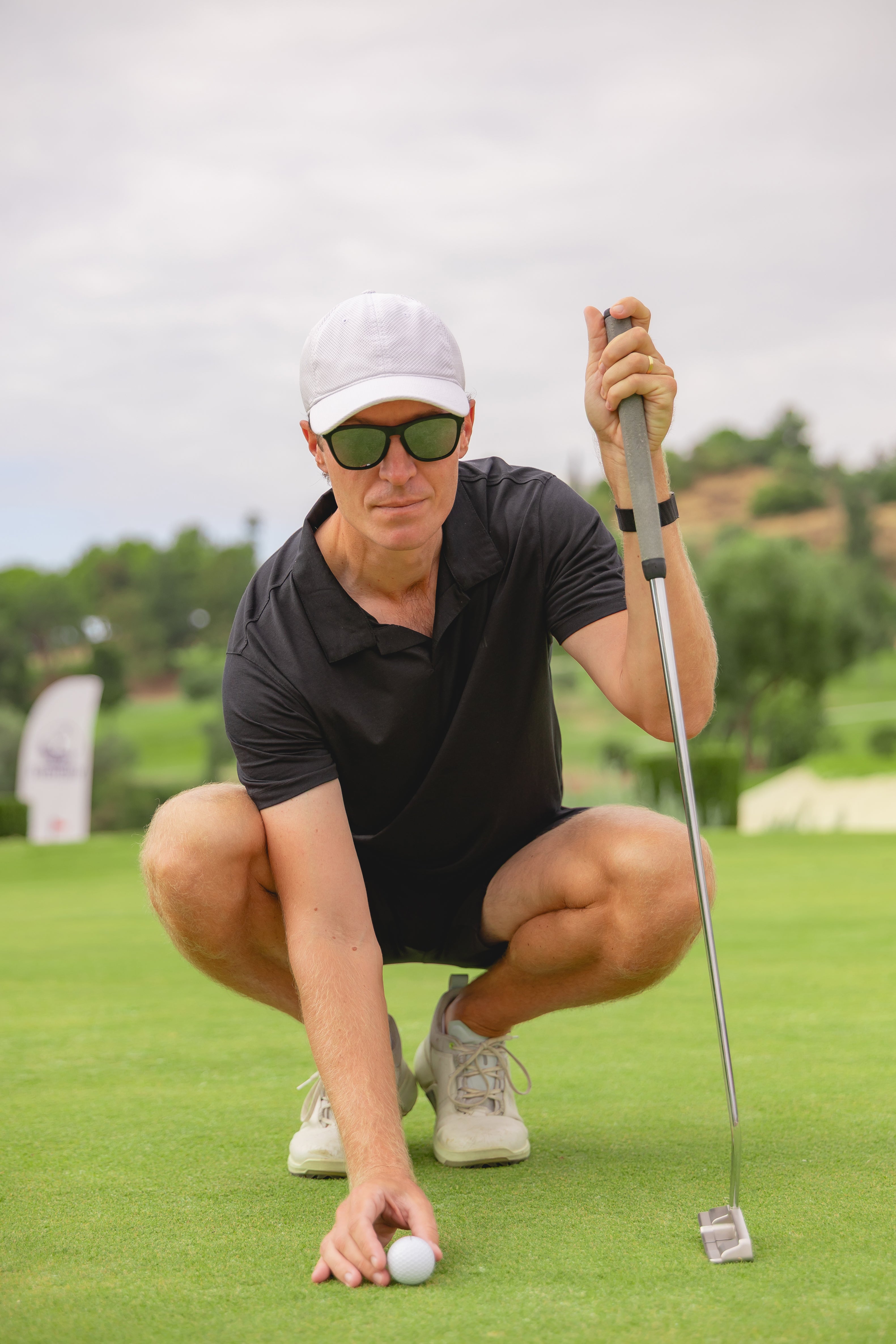 Golf player on putting green in Lyocell Polo Shirt