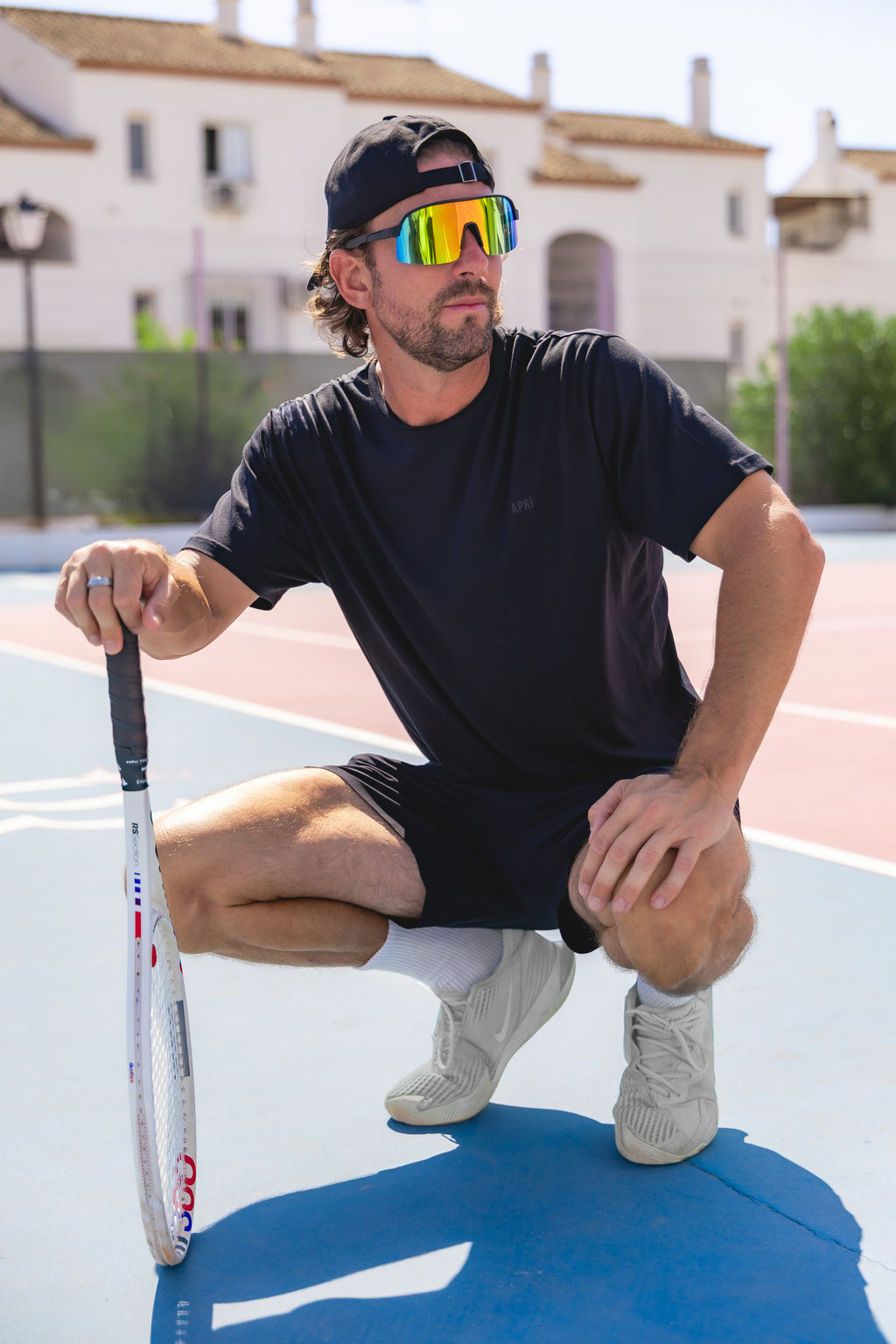 Tennis player in black lyocell t-shirt and black lyocell t-shirt
